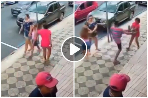 Schiaffeggia bambina per strada e viene presa a calci da passante: video shock